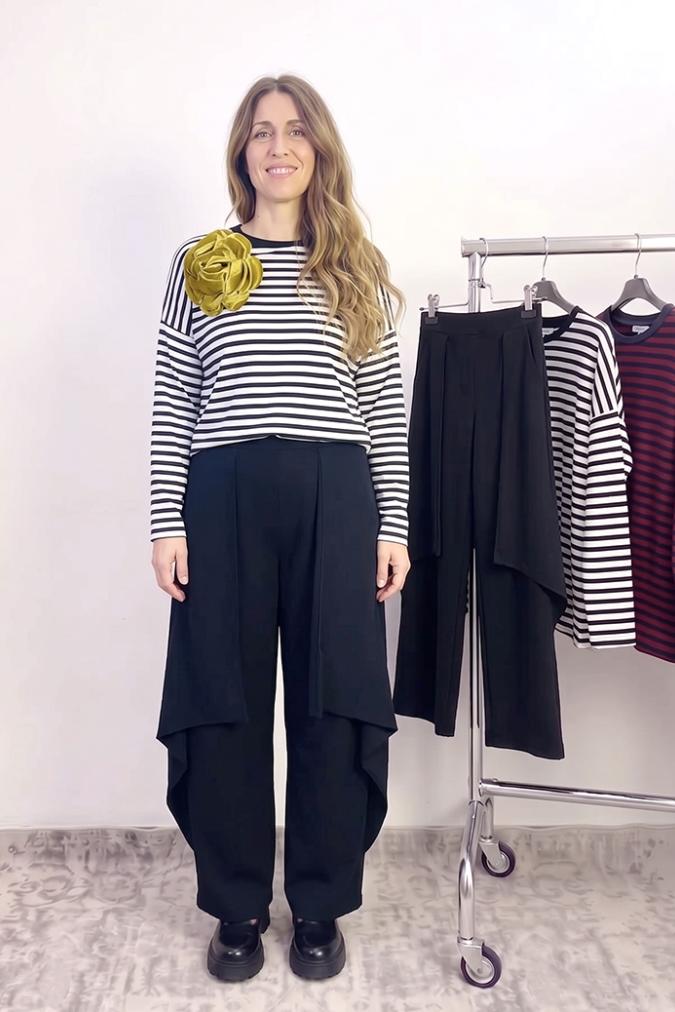 outfit con Maglia Guilde a righe bianche e nere e Pantalone Muguet nero
